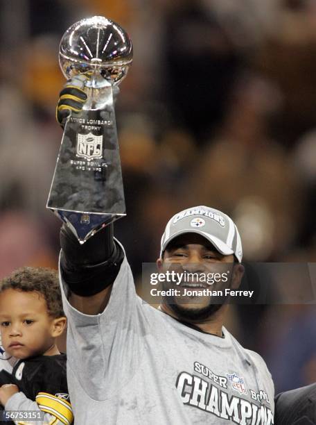 Running back Jerome Bettis of the Pittsburgh Steelers celebrates with the Vince Lombardi Tropy after defeating the Seattle Seahawks in Super Bowl XL...