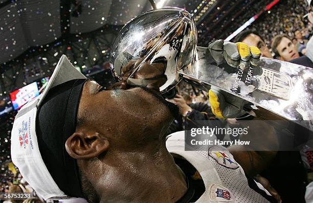 Linebacker Joey Porter of the Pittsburgh Steelers kisses the Vince Lombardi Tropy after defeating the Seattle Seahawks in Super Bowl XL at Ford Field...