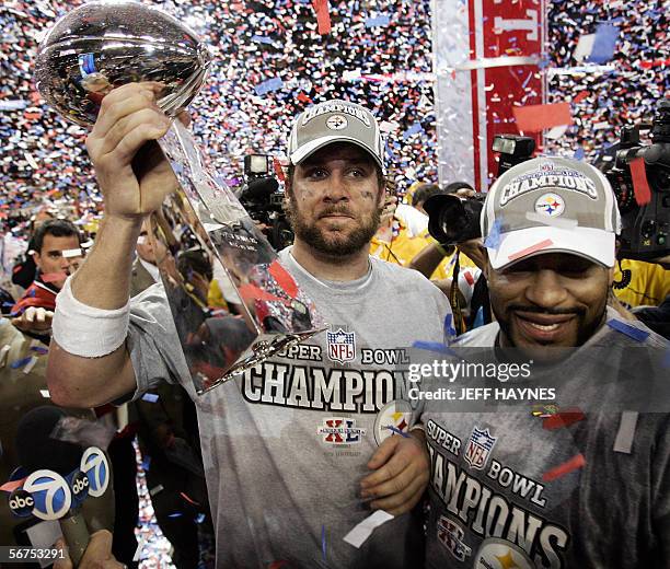 Detroit, UNITED STATES: Pittsburgh Steelers quarterback Ben Roethlisberger holds the Vince Lombardi trophy with teammate Jerome Bettis after his team...