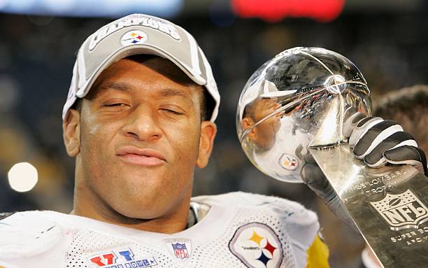 Clark Haggans the Pittsburgh Steelers celebrates with the Vince Lombardi Trophy after the Steelers' 21-10 victory over the Seattle Seahawks in Super...