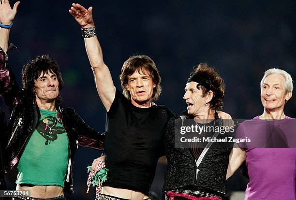 Musicians Ronnie Wood, Mick Jagger, Keith Richards and Charlie Watts of The Rolling Stones perform during the "Sprint Super Bowl XL Halftime Show" at...