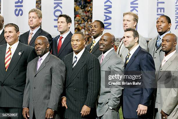 Former Super Bowl MVP's Trou Aikman, Steve Young, Desmond Howard, John Elway, Ray Lewis, Mark Rypien, Emmitt Smith, Dexter Jackson, Kurt Warner pose...