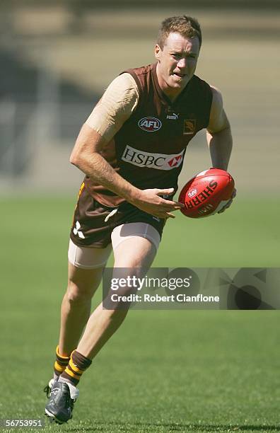 John Barker of the Hawks in action during a training session as part of the Hawthorn AFL Community Camp at Aurora Stadium February 6, 2006 in...