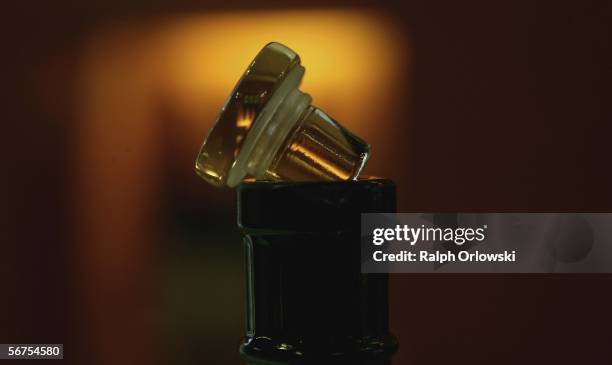 Glas cap, used alternatively to cork, lies on a wine bottle during a wine tasting at the wine-growing estate Schloss Vollrads on January 22, 2006 in...