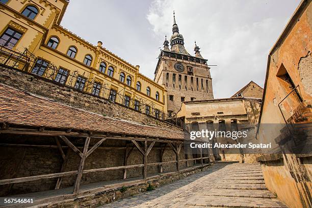 entrance into sighisoara citadel, romania - mures stock pictures, royalty-free photos & images