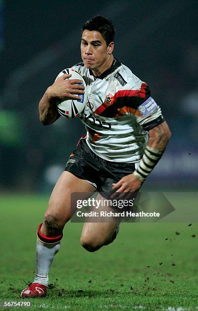 Shontayne Hape of Bradford in action during the Carnegie World Club Challenge between Bradford Bulls and Wests Tigers at the Galpharm Stadium on...