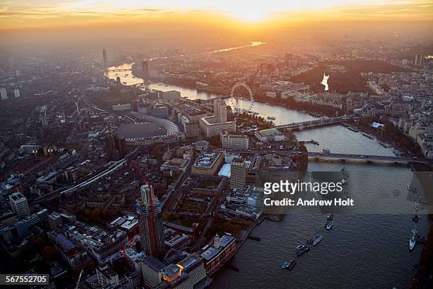 aerial view west of waterloo station and shell the london eye, houses of parliament - london sunrise stock pictures, royalty-free photos & images