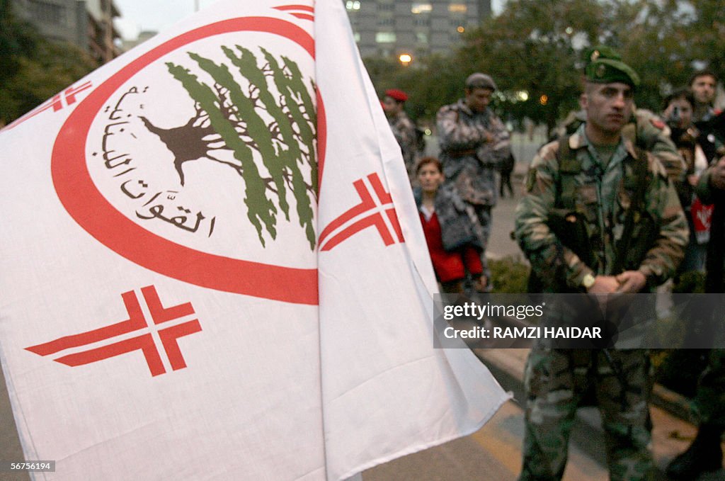 Lebanese soldiers stand next to a Lebane
