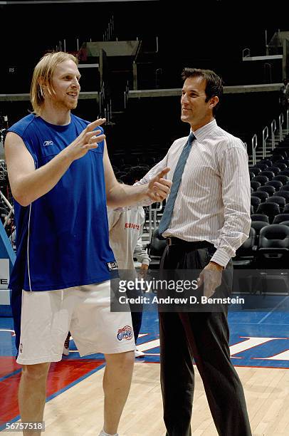 Chris Kaman of the Los Angeles Clippers and Clippers' TV broadcaster Michael Smith talk before the game with the Dallas Mavericks on January 20, 2006...