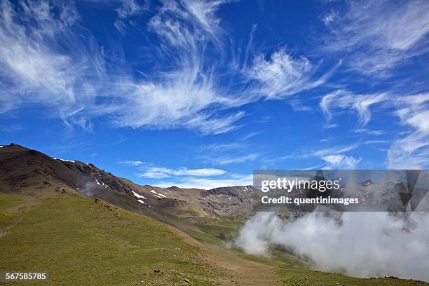 cloud and blue skies over valeta - andalucian sierra nevada stock pictures, royalty-free photos & images