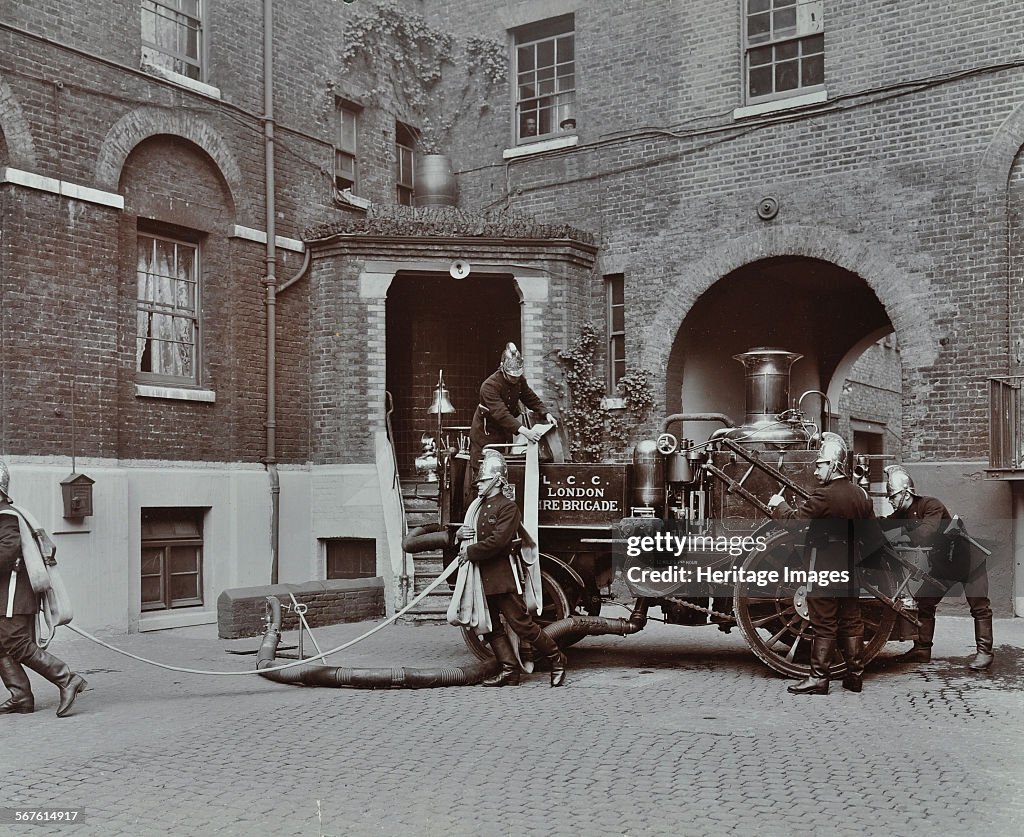 Firemen Demonstrating Motor Steamer Hoses, London Fire Brigade Headquarters, London, 1910