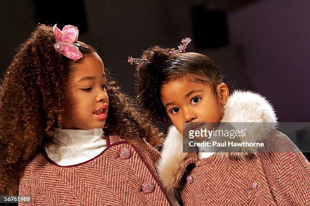 Ming Lee Simmons and Aoki Lee Simmons, daughters of music producer Russell Simmons and fashion model wife Kimora Lee Simmons, walk the runway at the...