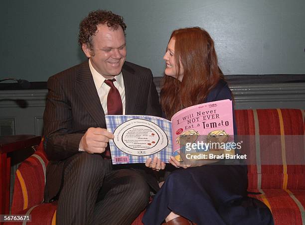 Actor John C. Reilly and actress Julianne Moore pose for a photo at the Children of Bellevue's Reach Out and Read 10th Anniversary Celebration at the...