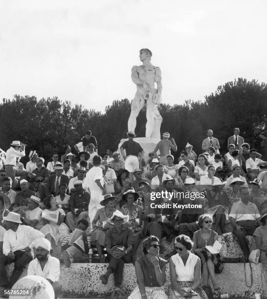 Spectators watching a Poland-Japan Olympic hockey match at the Stadio dei Marmi in Rome, 26th August 1960.