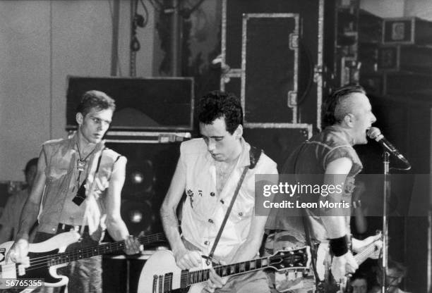 The Clash in concert, 1982. From left to right, Paul Simonon, Mick Jones and Joe Strummer.