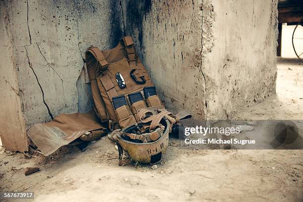 vest, equipment and helmet worn by us marines. - bullet proof vest stock pictures, royalty-free photos & images