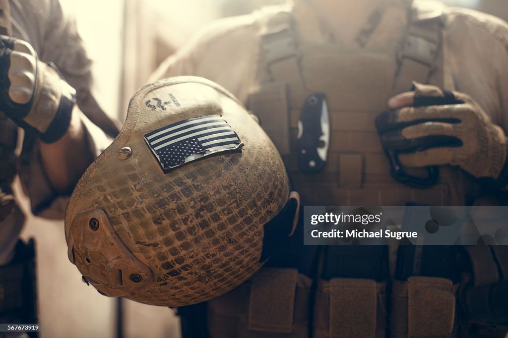 American flag on helmet of US Marine soldier.