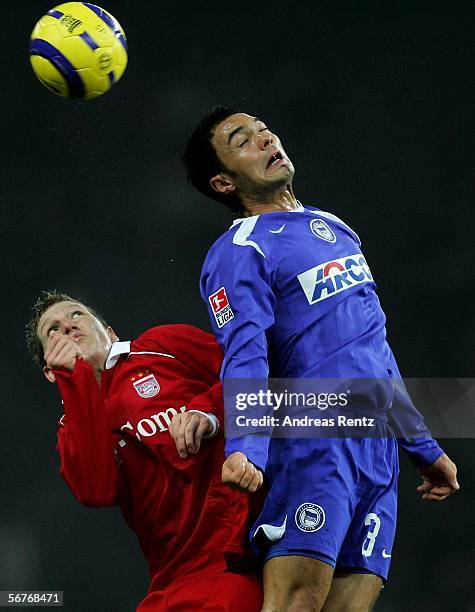Sofian Chahed of Berlin challenges for a header with Bastian Schweinsteiger of Munich during the Bundesliga match between Hertha BSC Berlin and FC...