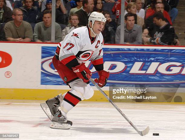Rod Brind'Amour of the Carolina Hurricanes skates the puck out of the defensive zone against the Washington Capitals at MCI Center on January 21,...