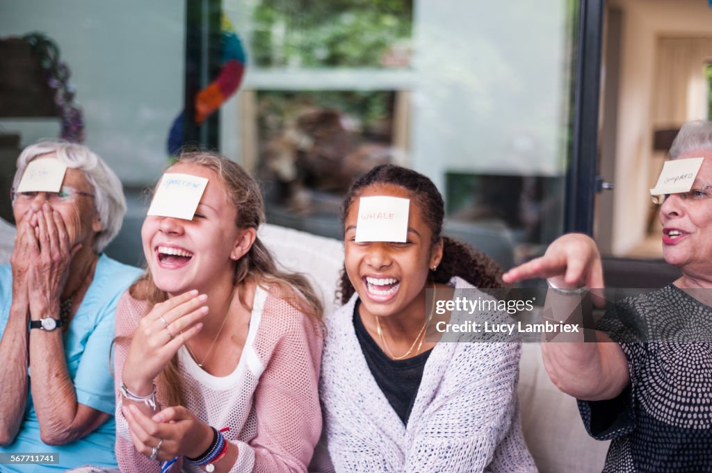 Family members playing game 'who am I?'