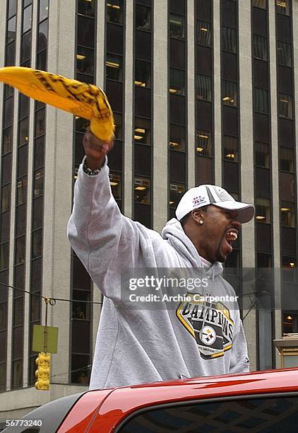 Pittsburgh Steelers running back Joey Porter waves a terrible towel during the victory parade celebrating winning Super Bowl XL February 7, 2006 in...