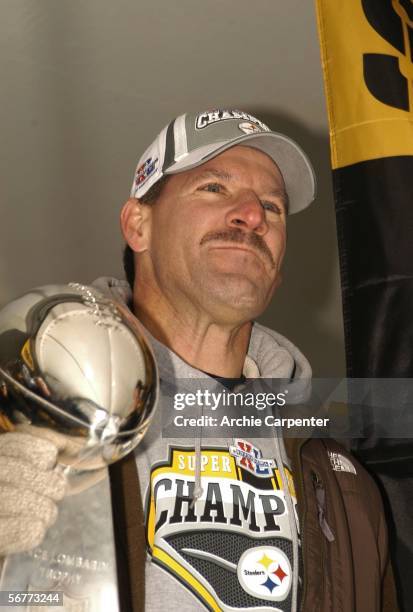 Pittsburgh Steelers head coach Bill Cowher pauses before speaking to the crowd gathered at the end of victory parade celebrating winning Super Bowl...