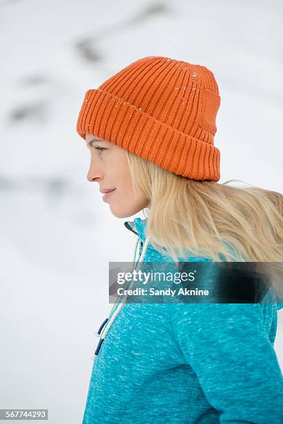 close-up of a woman looking away, crans-montana, swiss alps, switzerland - beautiful woman winter stock pictures, royalty-free photos & images