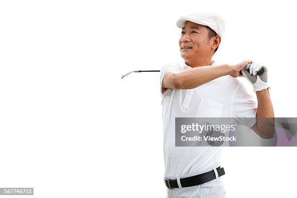 a middle-aged man is playing golf - golf swing on white stock pictures, royalty-free photos & images