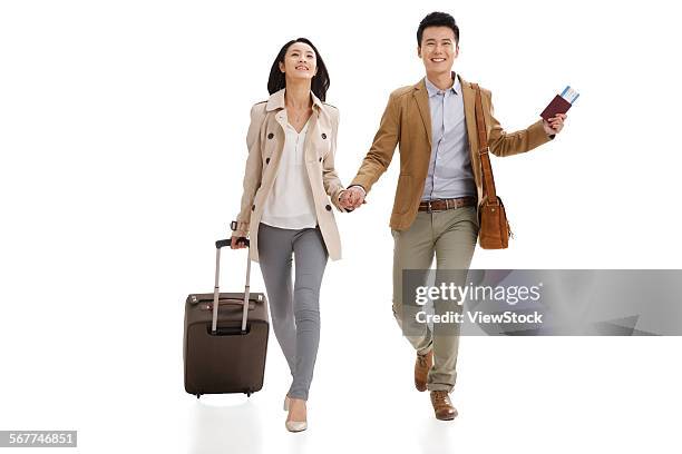 the joy of the young lovers travel - couple walk white background stock pictures, royalty-free photos & images