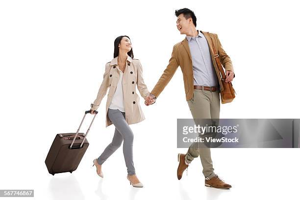 the young lovers happy travel - rolling luggage stock pictures, royalty-free photos & images