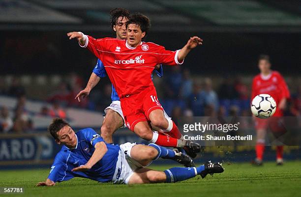 Benito Carbone of Middlesbrough is tackled by Matt Holland and Sixto Peralta of Ipswich Town during the FA Barclaycard Premiership match played at...