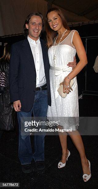Designer Luca Luca and Petra Nemcova pose after Lucas' show at Bryant Park February 7, 2006 in New York City.