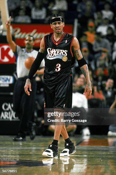 Allen Iverson of the Phoenix Suns grimaces as he walks on the court during a game against the Philadelphia 76ers at America West Arena on January 4,...