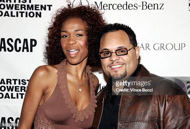 Singer Michelle Williams and Grammy Nominee Israel Holton arrive to the Artist Empowerment Coalition Celebration Luncheon Honoring Grammy Nominees...