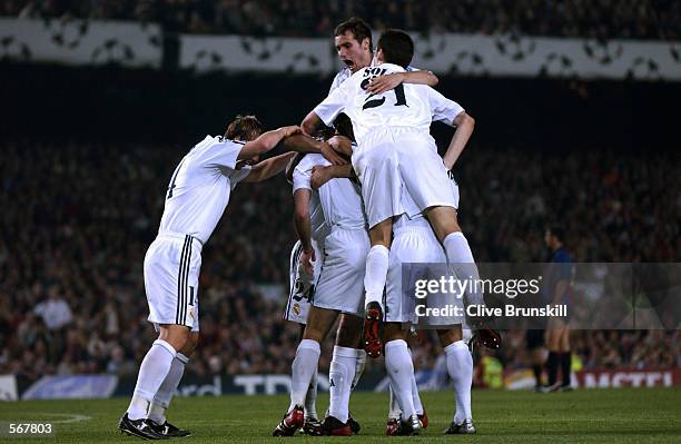 Real Madrid players celebrate Zinedine Zidane opening goal during the UEFA Champions League semi-final first leg match between Barcelona and Real...