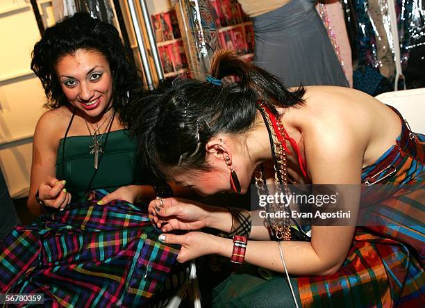 Fashion assistants prepare backstage at the Heatherette Fall 2006 fashion show at the "Tent" during Olympus Fashion Week in Bryant Park February 7,...