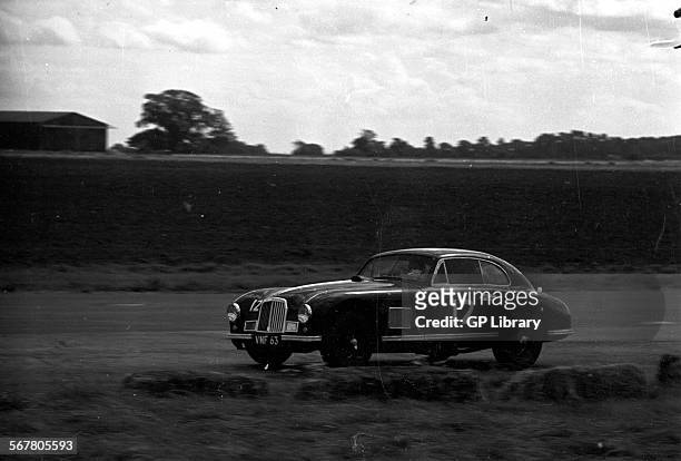 An Aston Martin DB2 competing in the International Trophy at Silverstone, England 1950.
