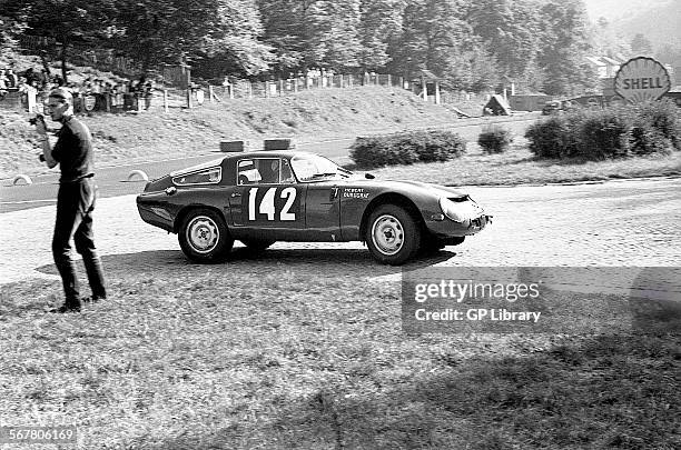 Jean Hebert-Georges Burggraff's Alfa Romeo Giulia TZ at the Nouveau Monde Hairpin on the Rouen-les-Essarts stage. Tour de France, 20 Sept 1964.