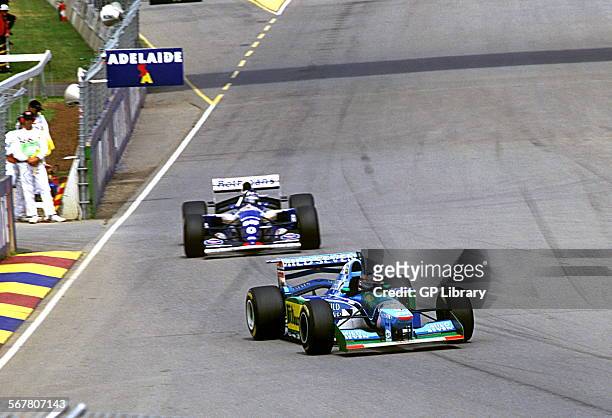 Michael Schumacher in a Benetton B194 and Damon Hill in a Williams before their collision left Schumacher World Champion and denied Hill the title....