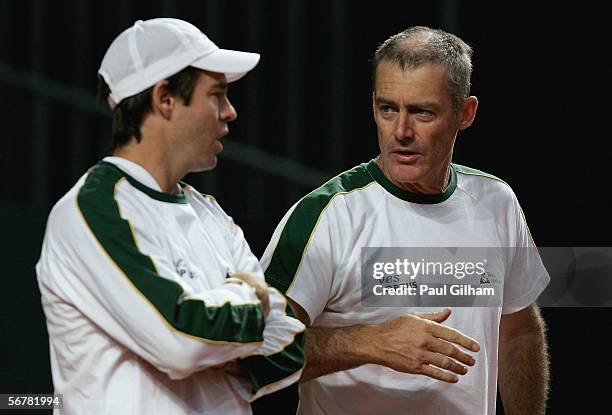 Australian Davis Cup Team Captain John Fitzgerald talks to Coach Todd Woodbridge during an Australian practice session prior to the Davis Cup first...