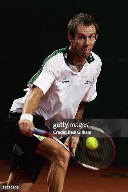 Paul Hanley of Australia hits a backhand during an Australian practice session prior to the Davis Cup first round match between Switzerland and...