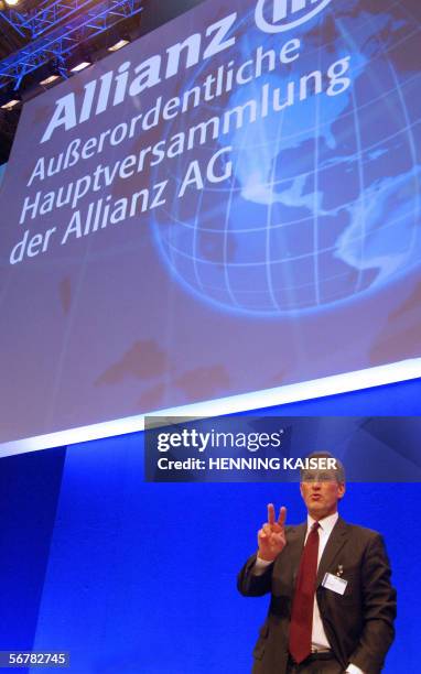 Michael Diekmann, chairman of German insurance giant Allianz, gestures at the beginning of an extraordinary general meeting 08 February 2006 in...