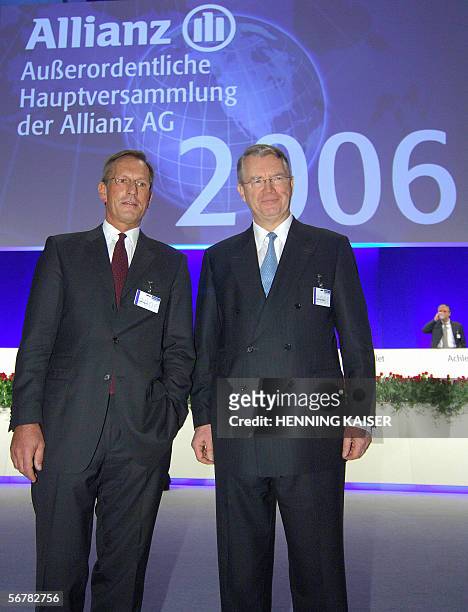 Michael Diekmann , chairman of German insurance giant Allianz, and supervisory board chairman Henning Schulte-Noelle pose at the beginning of an...