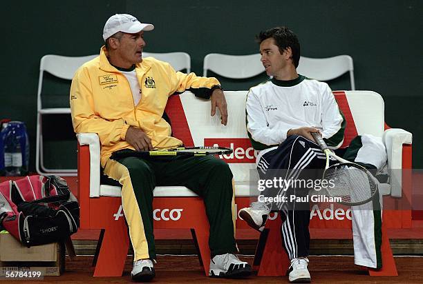 Australian Davis Cup Team Captain John Fitzgerald talks to Coach Todd Woodbridge during an Australian practice session prior to the Davis Cup first...