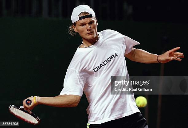 Peter Luczak of Australia hits a forehand during an Australian practice session prior to the Davis Cup first round match between Switzerland and...