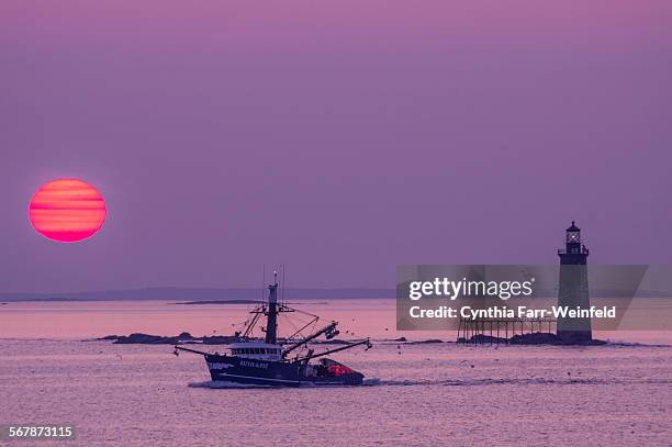 dawn fishermen at ram island light - boothbay harbor stock pictures, royalty-free photos & images
