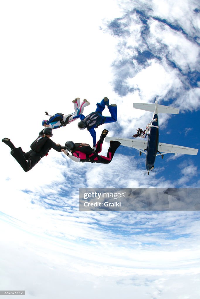 Skydivers group exit from the plane