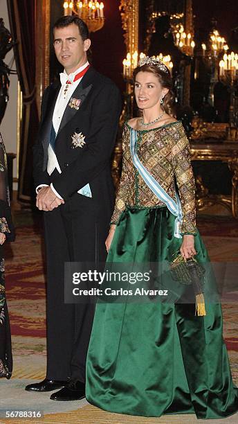 Crown Prince Felipe and Princess Letizia of Spain attend an official dinner in honour of Russian President Vladimir Putin at the Royal Palace, on...