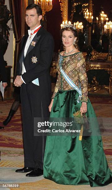 Crown Prince Felipe and Princess Letizia of Spain attend an official dinner in honour of Russian President Vladimir Putin at the Royal Palace, on...