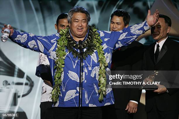 Los Angeles, UNITED STATES: Best Hawaiian Album winner Masters of Hawaiian Slack Ket Guitar stand together during the 48th Annual Grammy Awards...